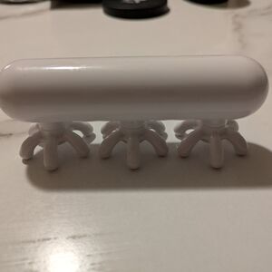 White Handheld Massager